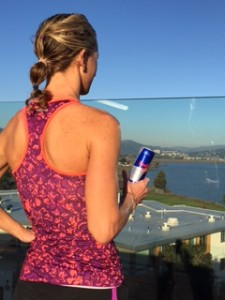Meredith Kessler triathlete holding Red Bull energy drink can