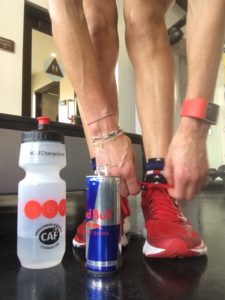 Meredith Kessler Red Bull Can tying shoe