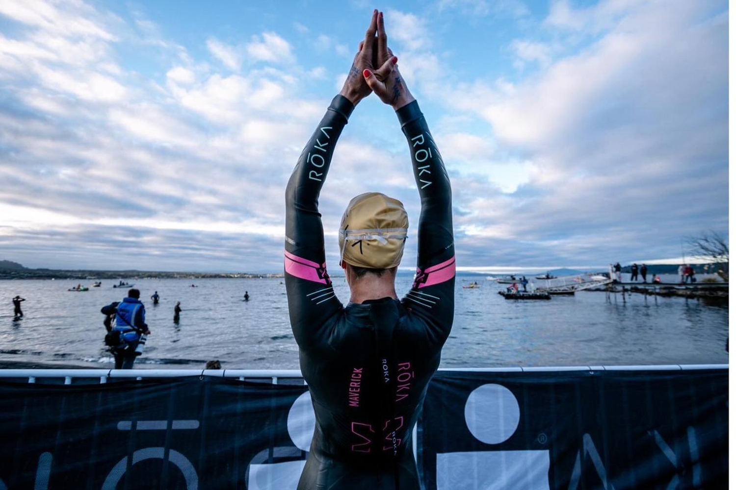 Meredith in a wetsuit at the water’s edge before the swim start