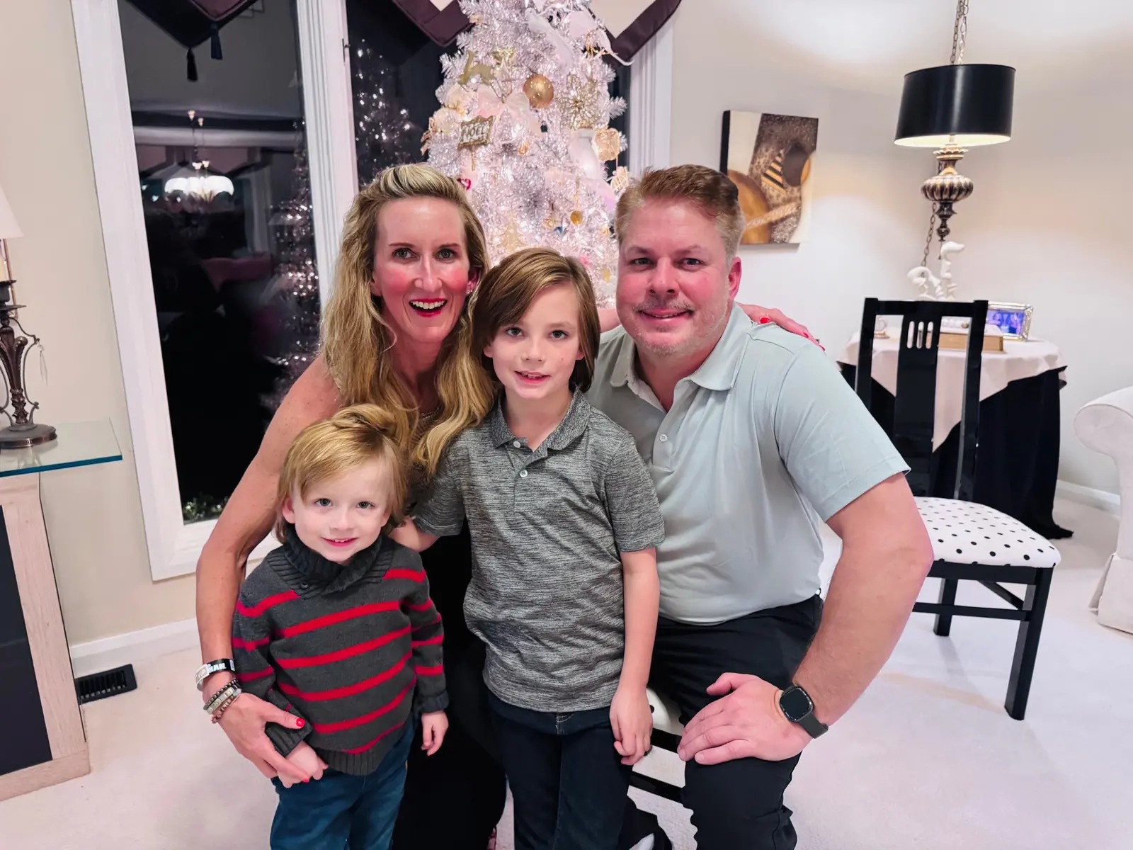 Meredith with Aaron, Mak, and Crew at home during the holidays