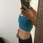 Meredith Kessler Triathlete Baby Bump holding Iphone