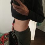 Meredith Kessler Triathlete Baby Bump Holding Phone