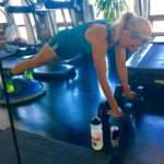 Meredith Kessler Triathlete Pushups in Gym with Red Bull